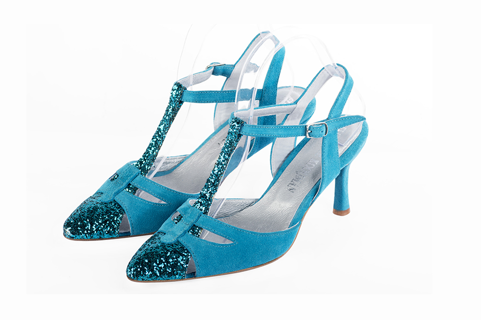 Turquoise blue women's open back T-strap shoes. Tapered toe. High slim heel. Front view - Florence KOOIJMAN